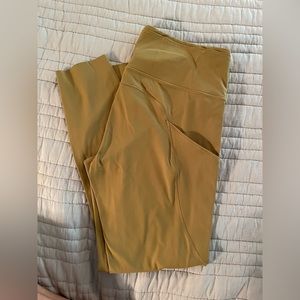 Lululemon Fast and Free High-Rise Tight 25". Size 10. EUC. Gold-green color.